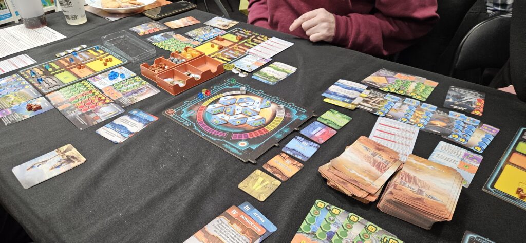 Photo montrant les éléments du jeu de société « Terraforming Mars: Expédition Arès ».